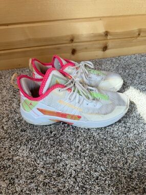 Jordan Women's White Mesh Athletic Shoes with Pink and Neon Accents